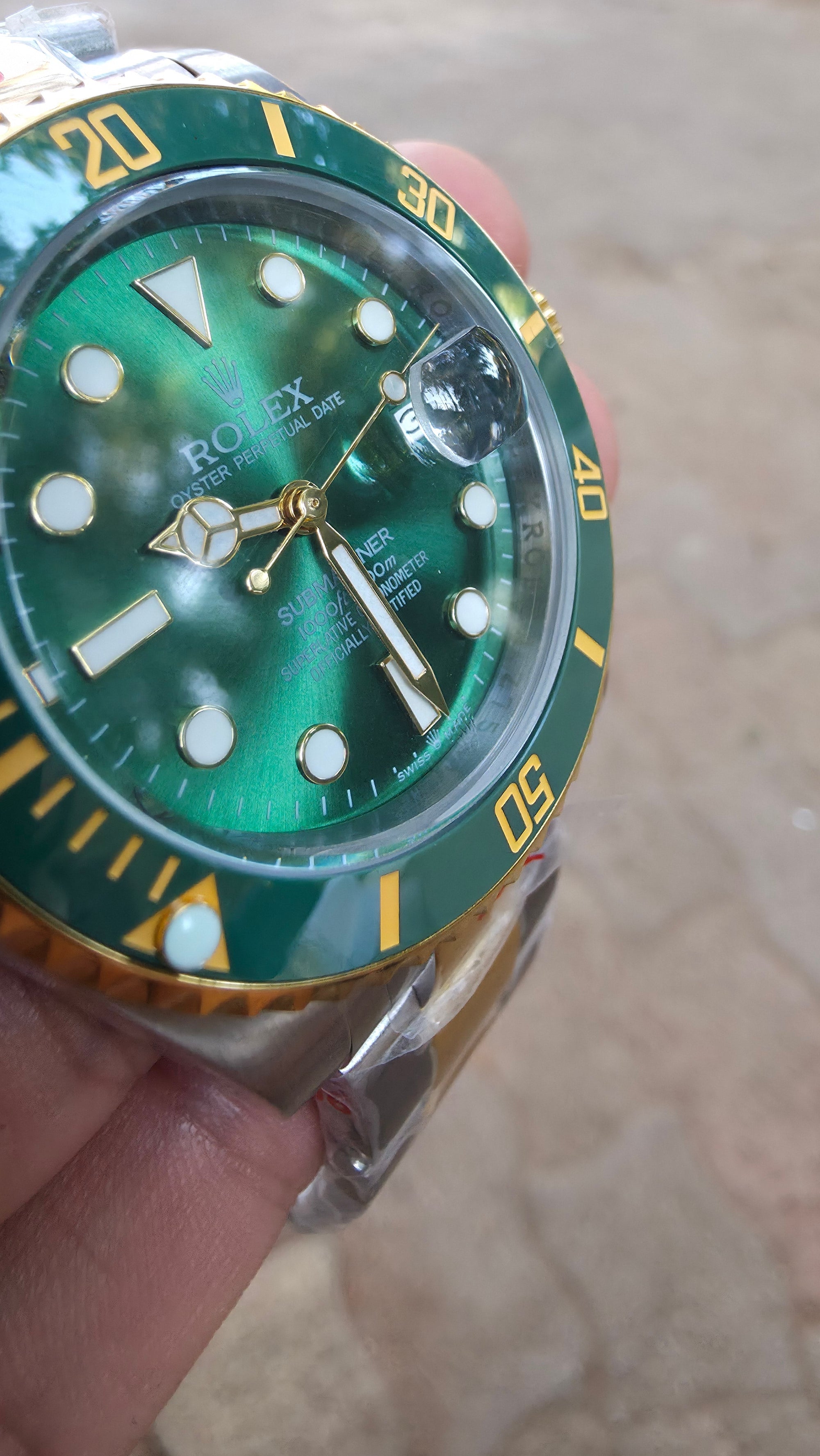 SUBMARINER GREEN GOLD