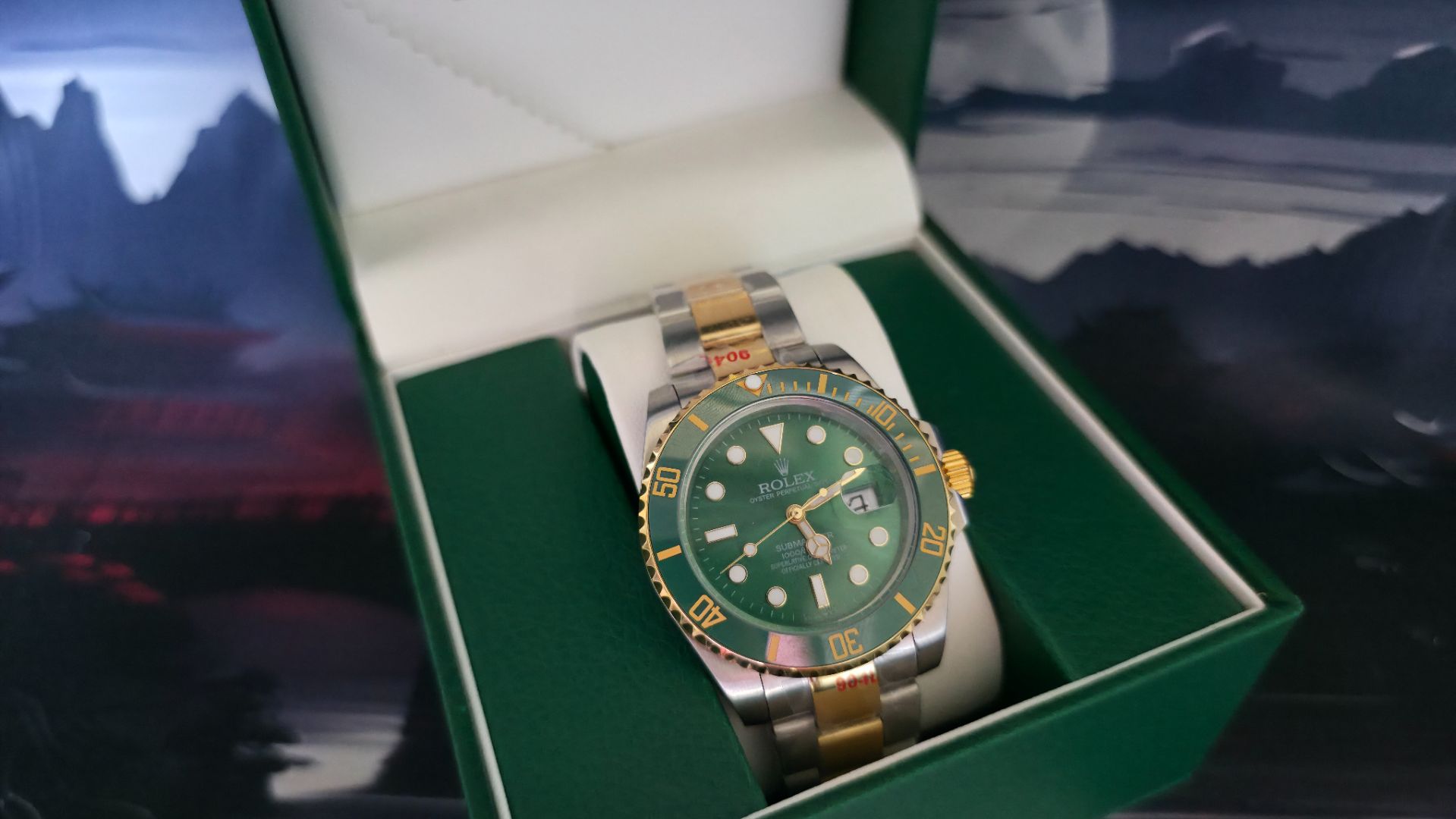 SUBMARINER GREEN GOLD